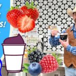 Promotional thumbnail with a cowboy-themed host holding a cup, oversized strawberries and berries, and bold text 'Healthy Foods for Kids' on a blue background.